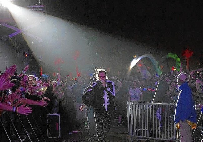 Lead vocalist Win Butler of rock band Arcade Fire performs at the Coachella Valley Music and Arts Festival in Indio